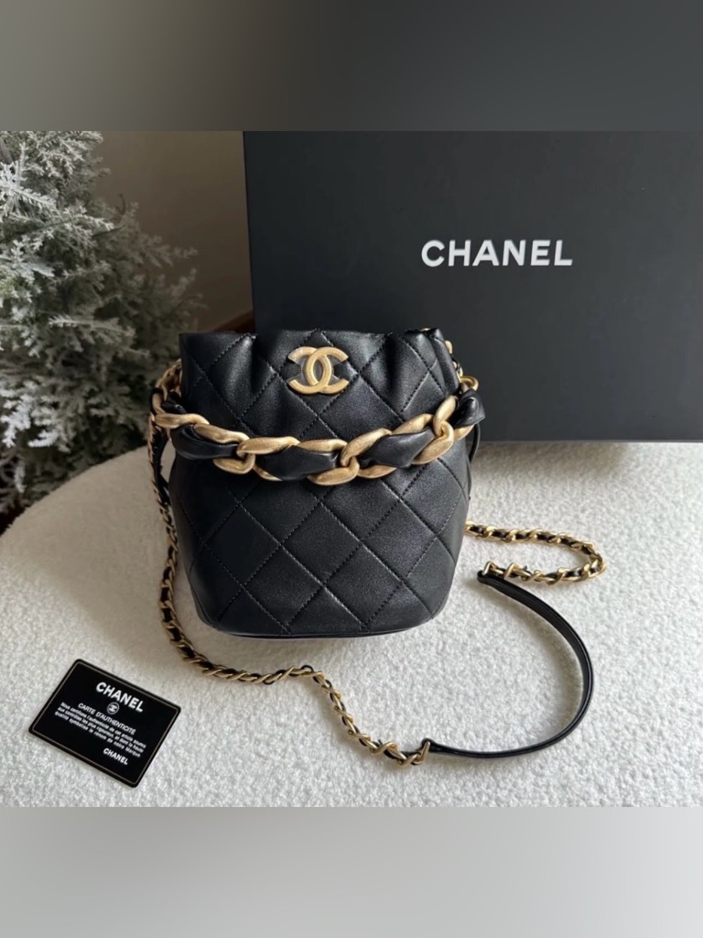 CHANEL Black Quilted Mini Crossbody Bucket Bag with Gold Hardware